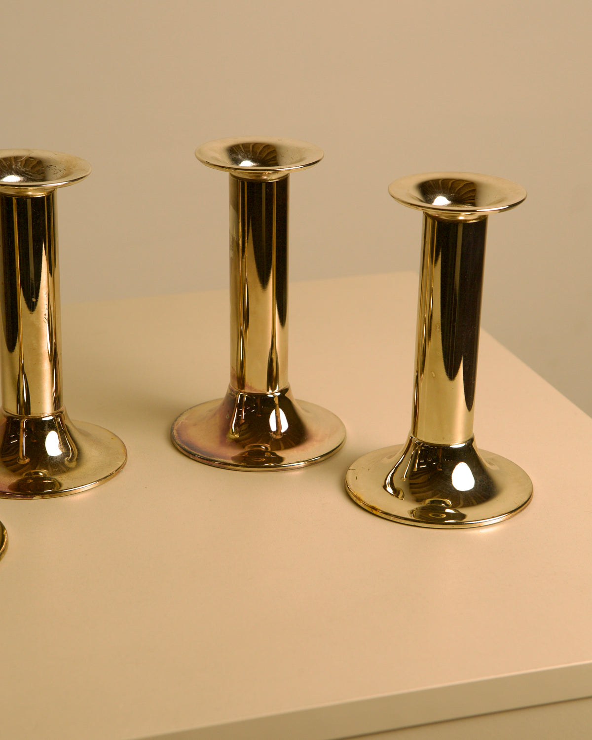 Set of 4 Italian silvered metal candle holders, 1970s — side angle