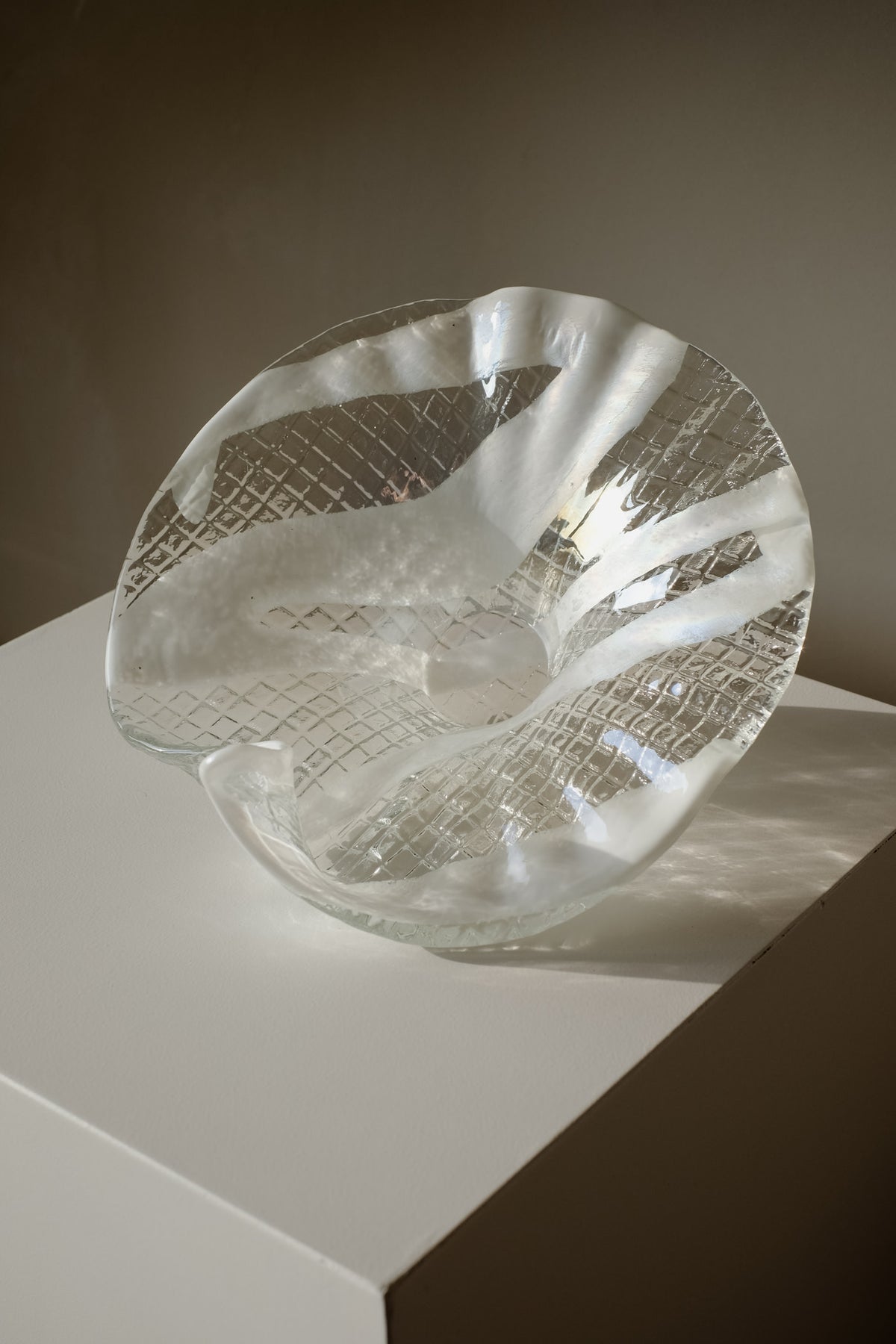 Italian Glass Bowl — angled view on white pedestal