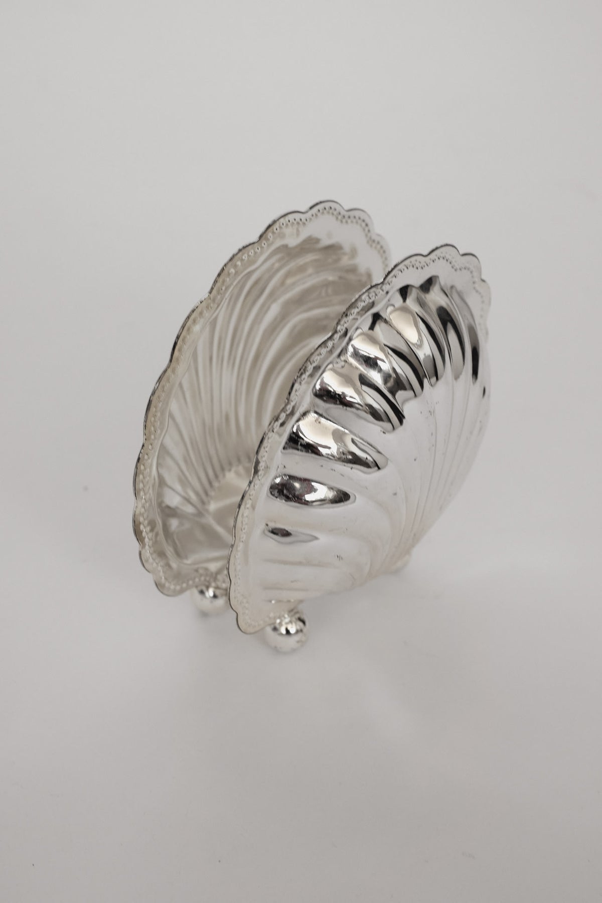Vintage Silver-Plated Shell Napkin Holder — side angle