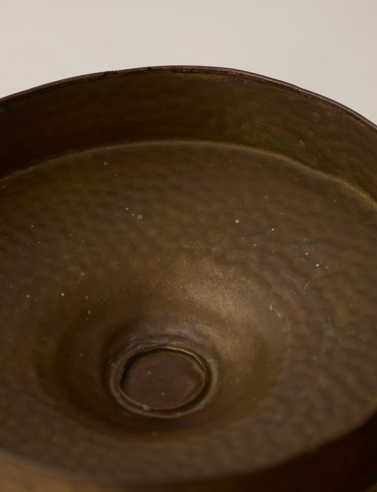 Metal Pedestal Bowl — top view of textured bronze interior