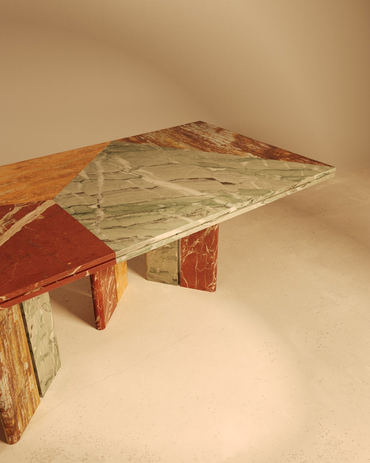 Multicolored marble dining table with geometric base design