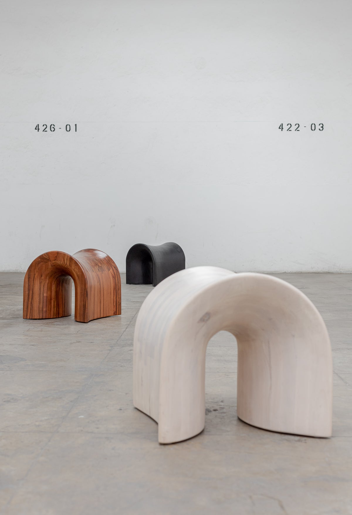 TORO Oak Stool — three stools in natural wood and black finish