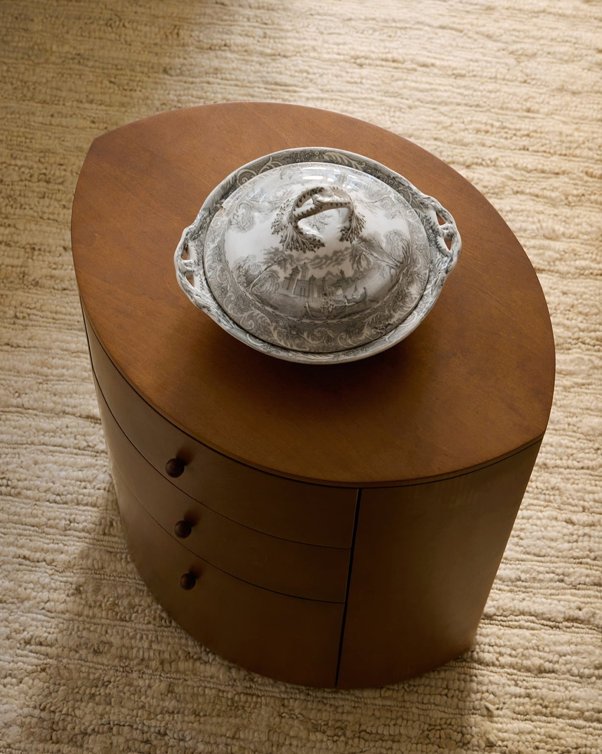 Observer nightstand warm brown birch with vintage ceramic bowl styling