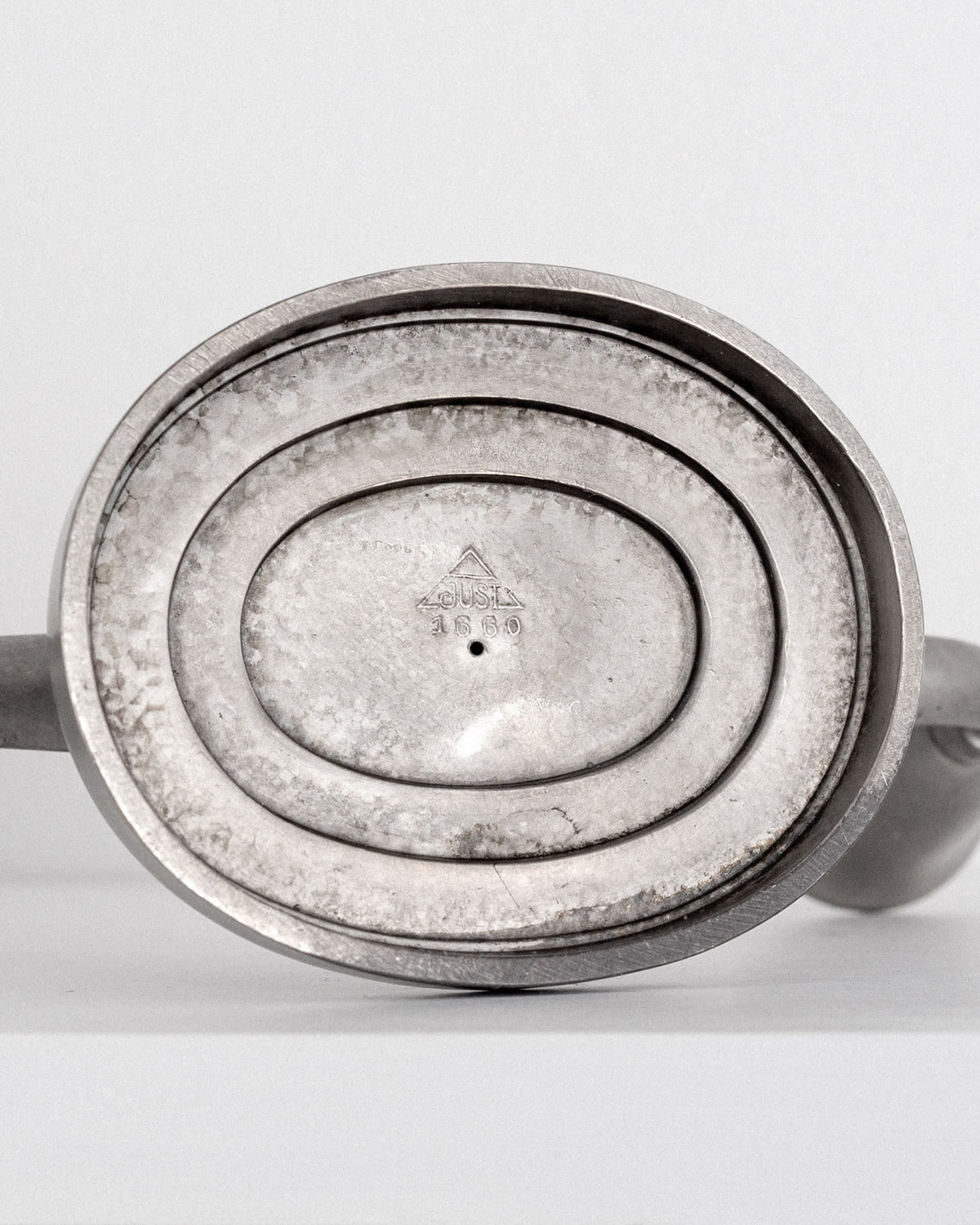 Pair of Pewter Candelabras by Just Andersen, Denmark, 1930s-40s — top view highlighting engraved base details