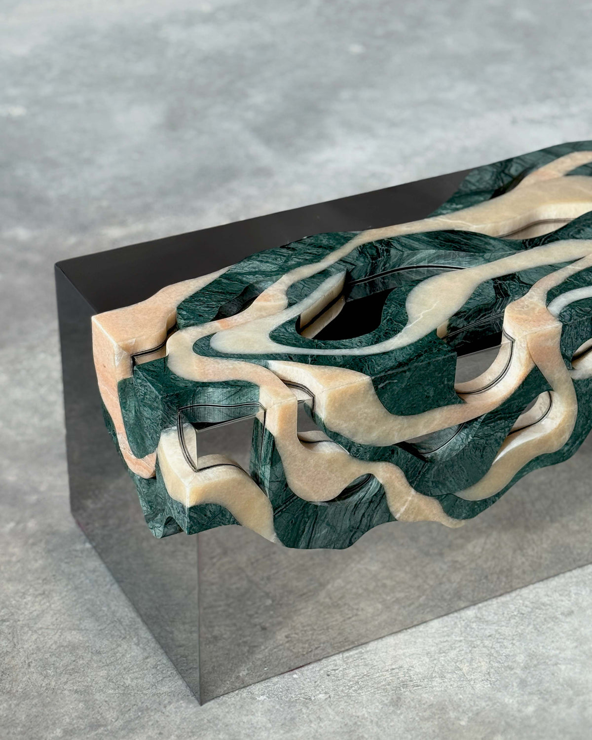 Orbis bench sculptural wood detail with flowing organic curves