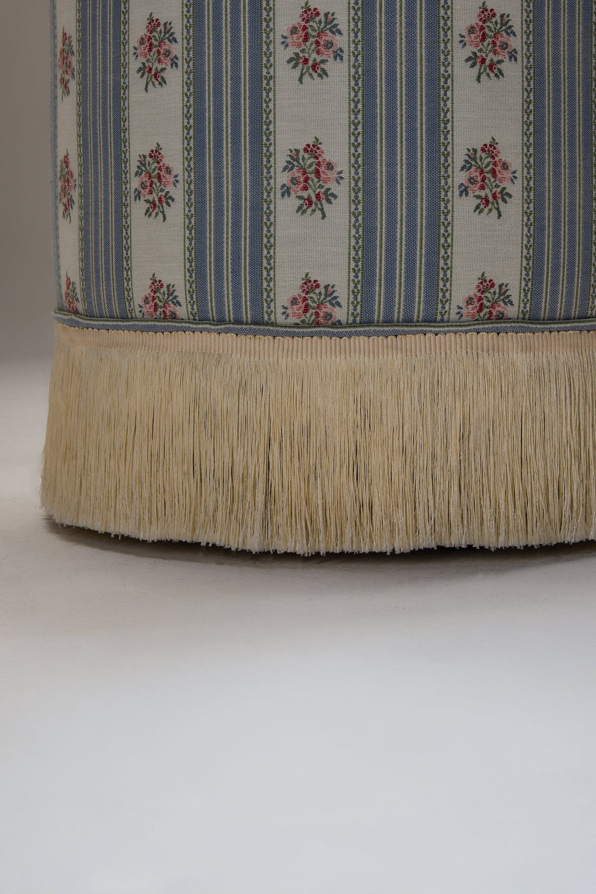 POMONA POEF - SOFA STRIPE 1 — close-up of fabric with fringe detail