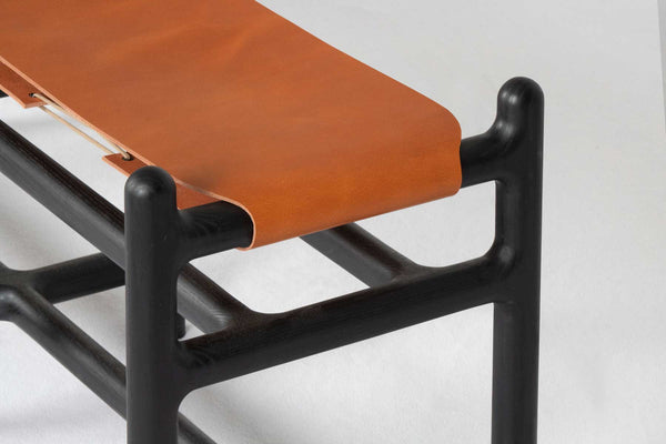 Lyndoe Bench in Solid Wood and Leather — close-up of leather seat detail