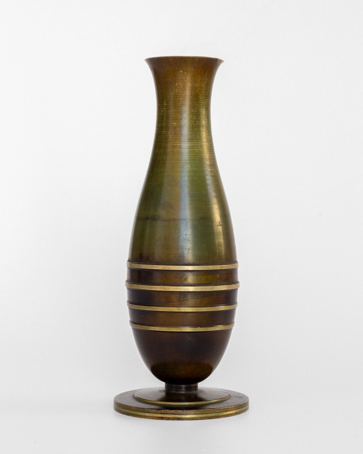 Modernist bronze vase with brass striped detail on circular base