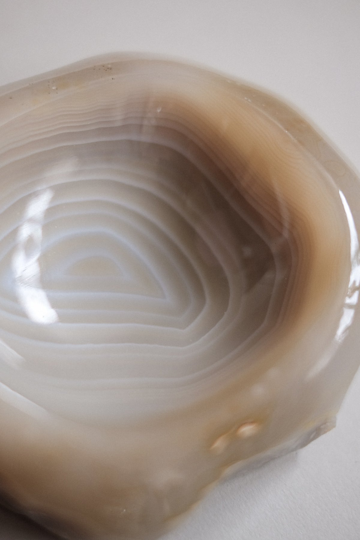 Polished agate bowl interior showing natural banded stone patterns