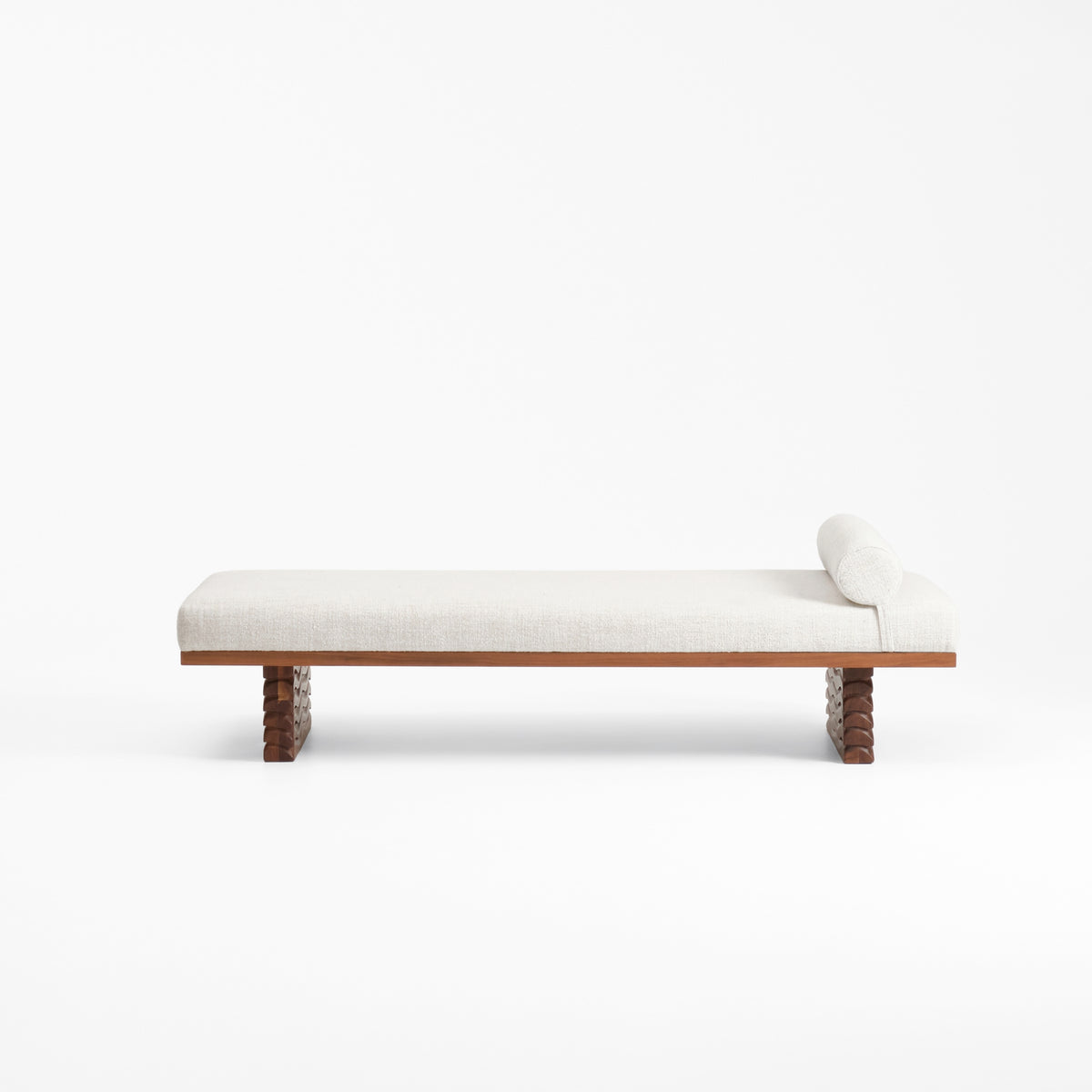 Nazaré Daybed — side view of light fabric and wooden legs