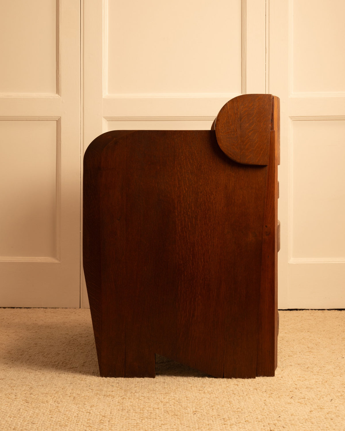 Anthroposophical solid wood armchair sculptural profile view