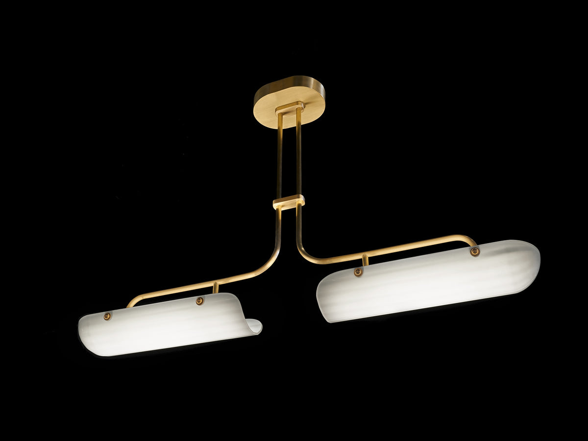 Modern brass pendant lamp with white glass shades in asymmetrical design