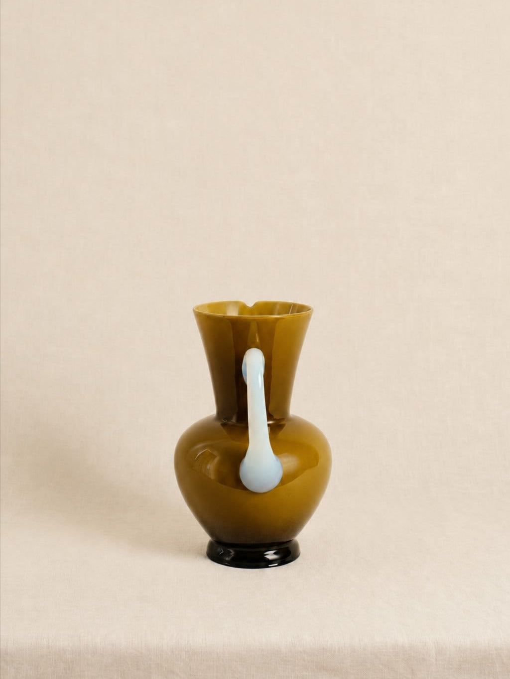 Vintage Amber Glass Pitcher with Opaline Handle — close-up