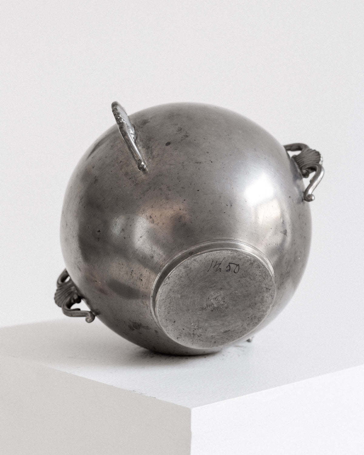 Spherical Art Deco Pewter Vase by C.G. Hallberg, 1934 — bottom view showing smooth pewter surface