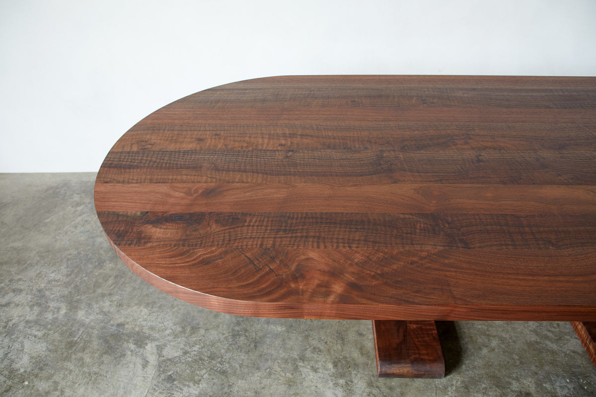 Alpen Long Dining Table — top view of rich walnut wood surface