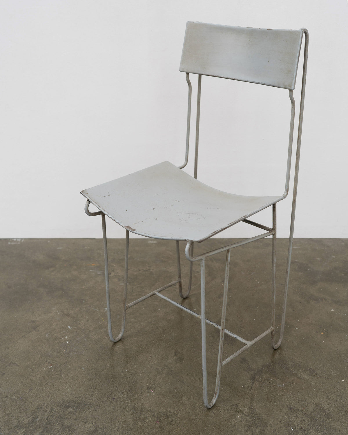 Modernist Steel Chair — top view of gray metal seat