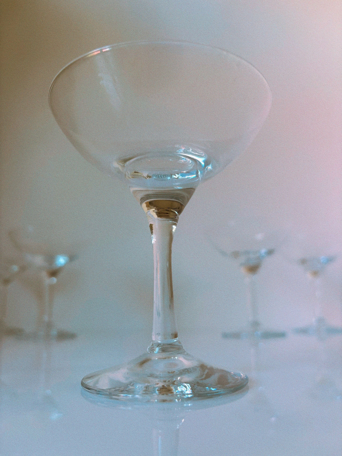 Close-up view of Art Deco cocktail glass showing elegant stem detail
