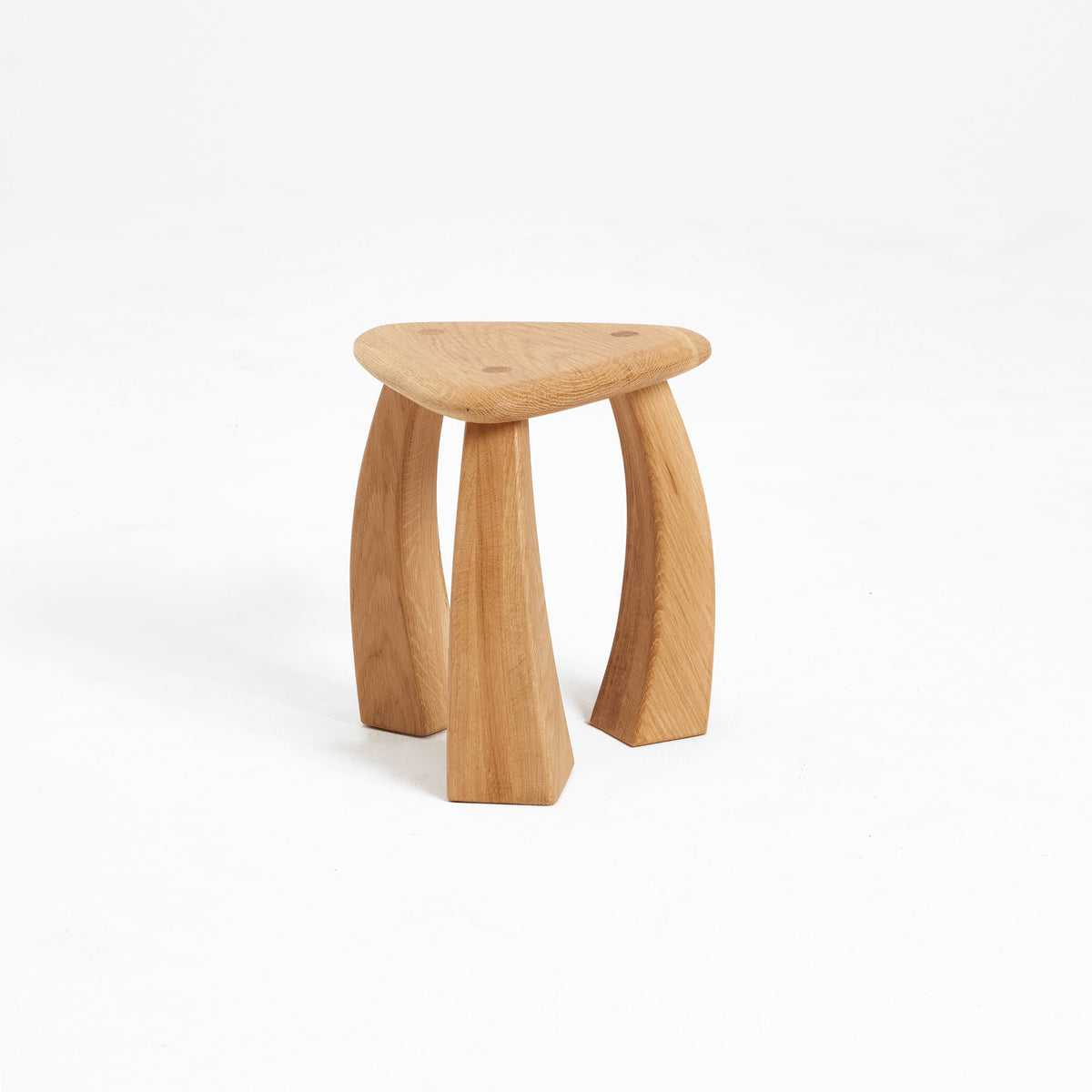 Arc de Stool '37 — top view of triangular oak seat