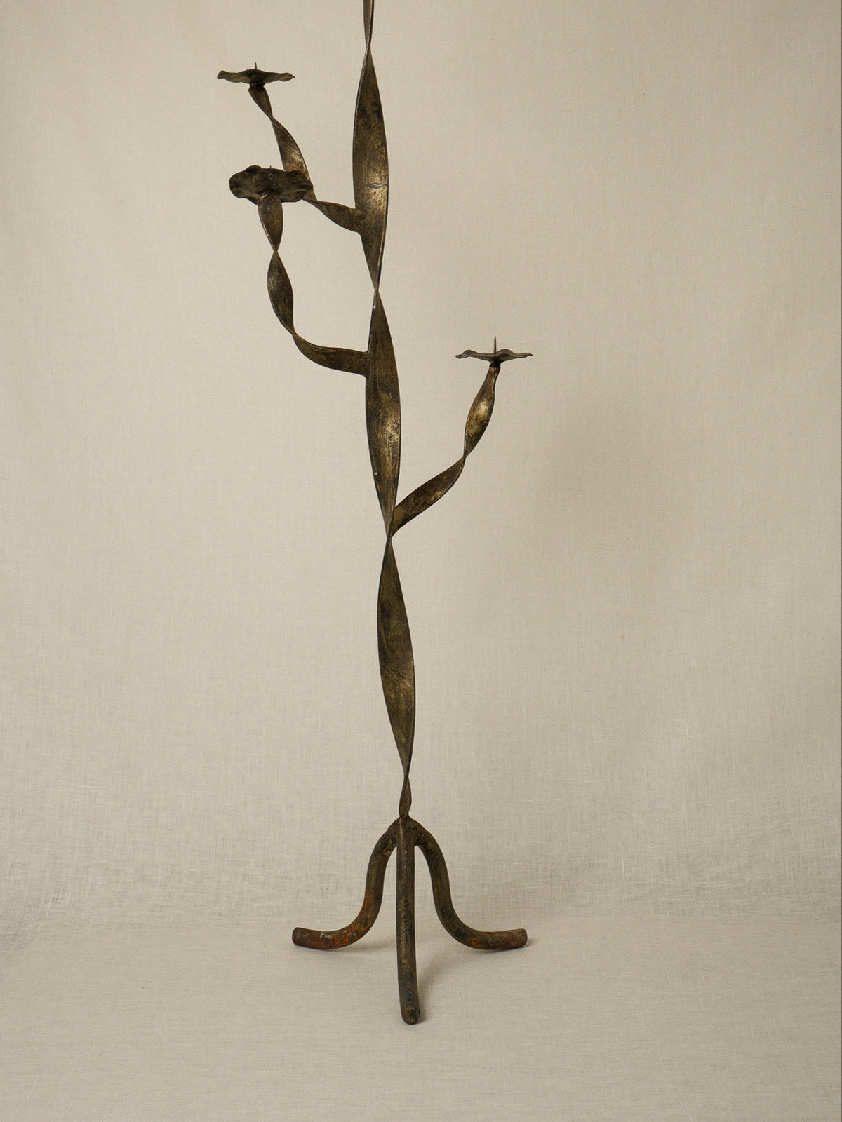 Pair of Gold-Patinated Iron Candlesticks — close-up