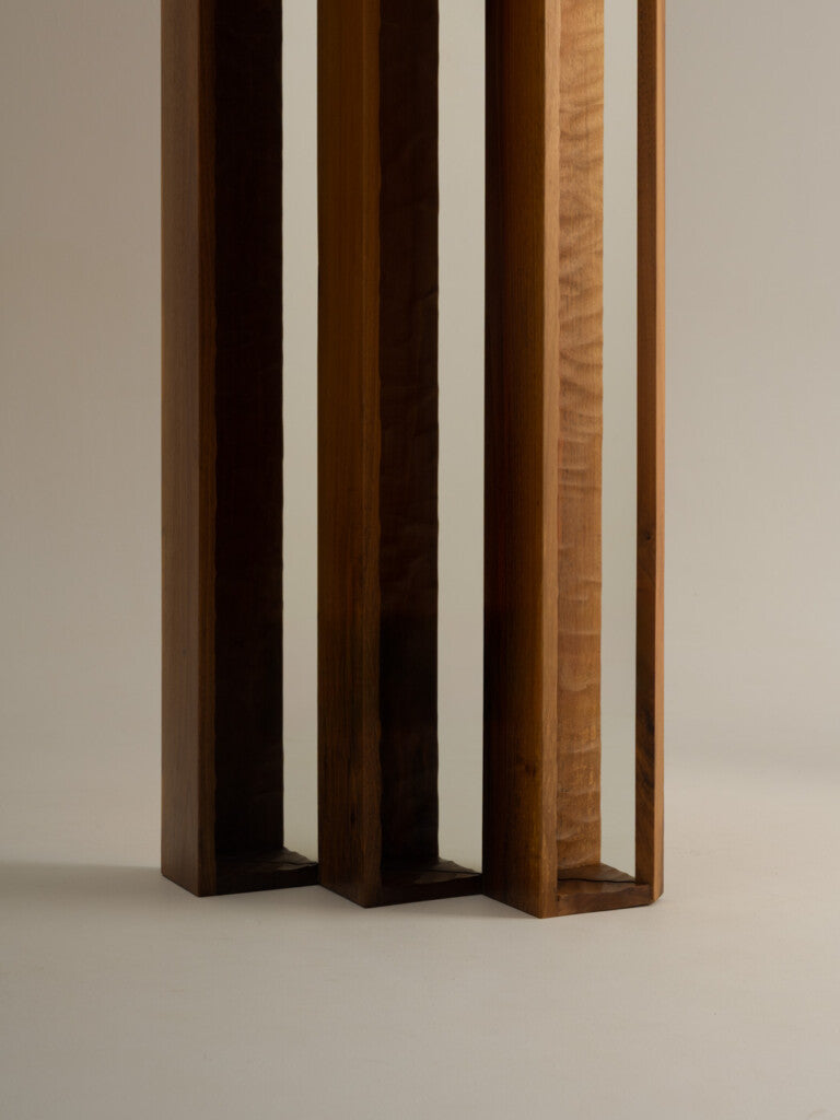 Large Perception Mirror — close-up of wooden legs in neutral setting