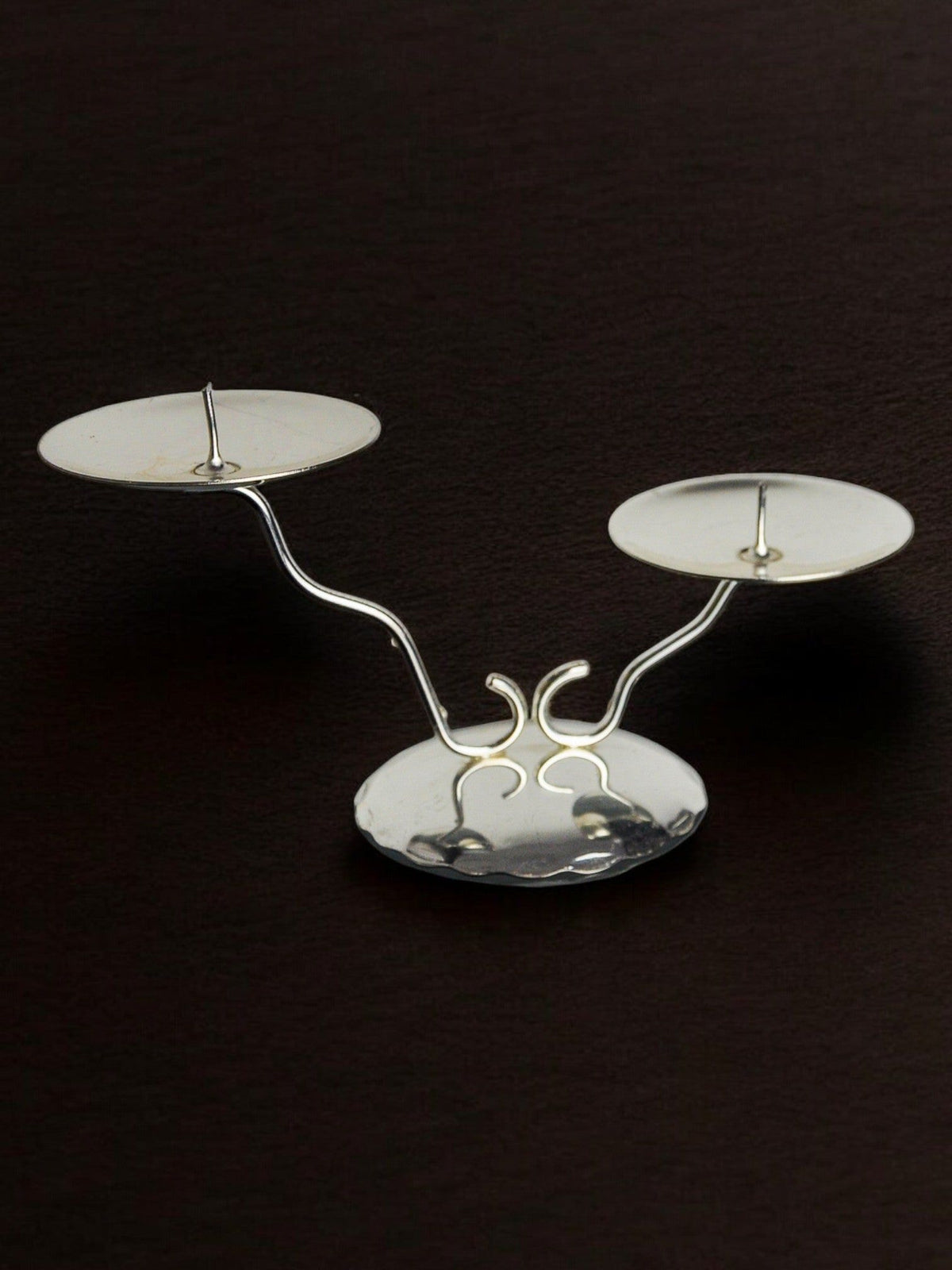 Art deco Candleholder, Spain, 1980s — angled view on dark surface