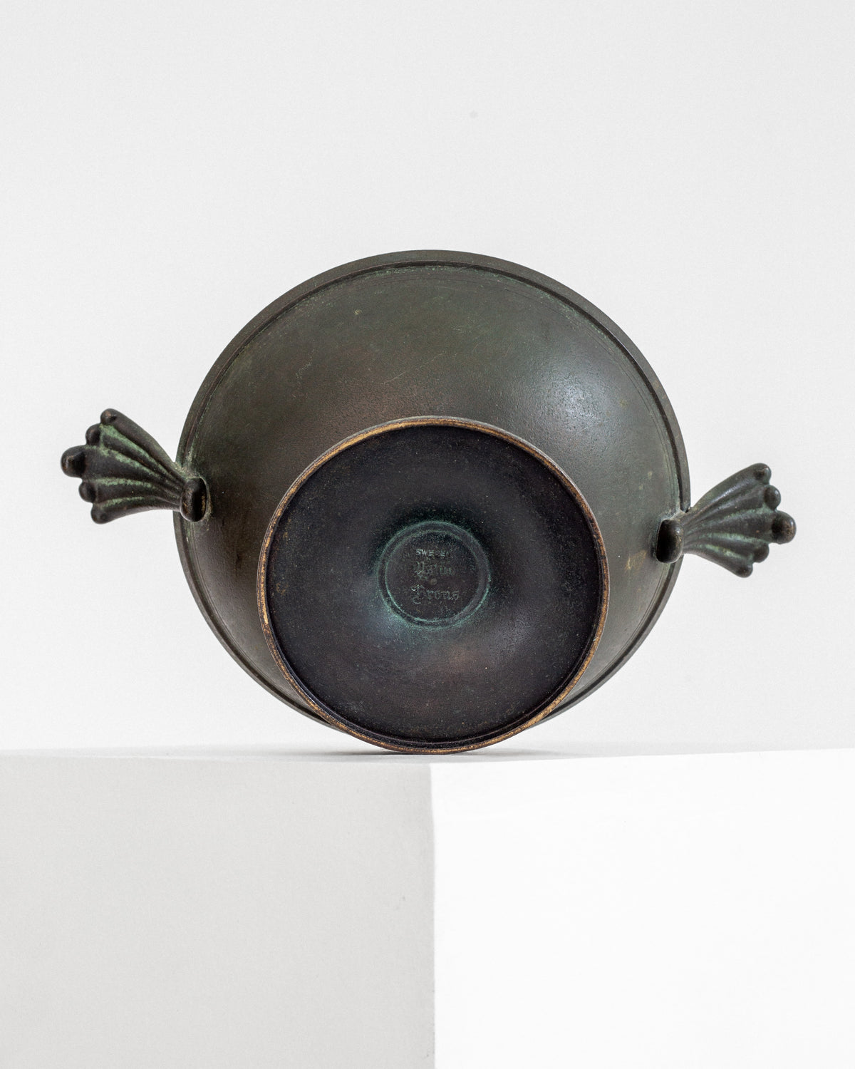 Art Deco bronze bowl interior view with decorative handles