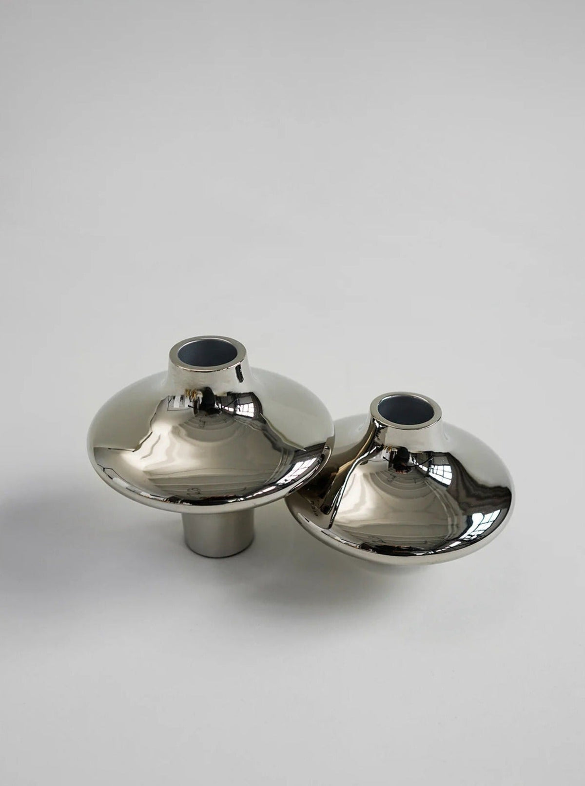 Doublet Candleholder - Small - Silver — top view of shiny silver surface