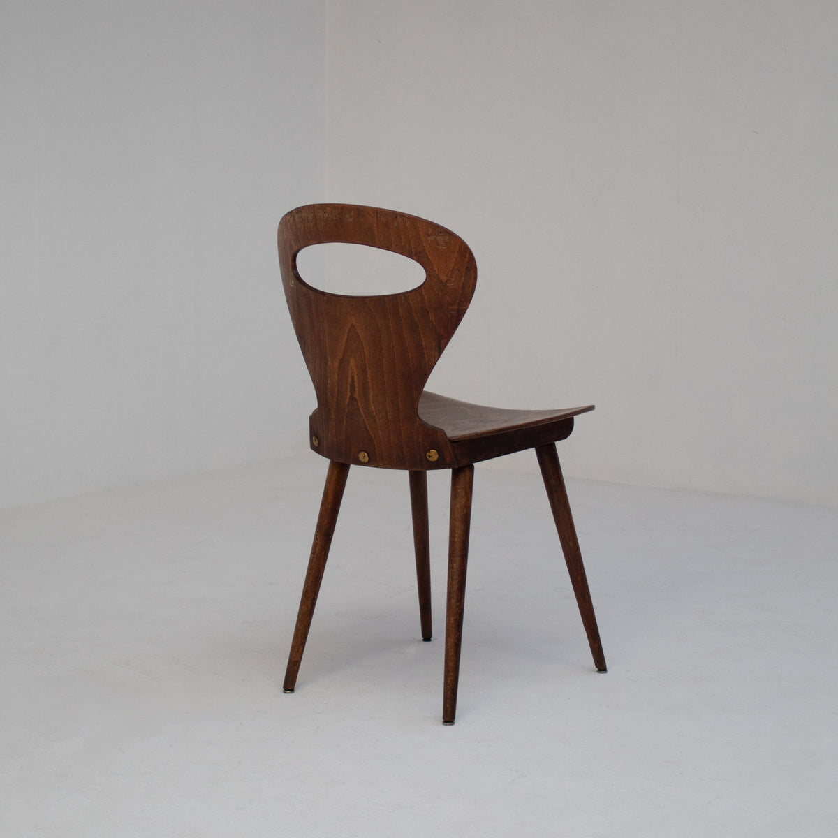 Set of Six Sculptural Wooden Dining Chairs — in context