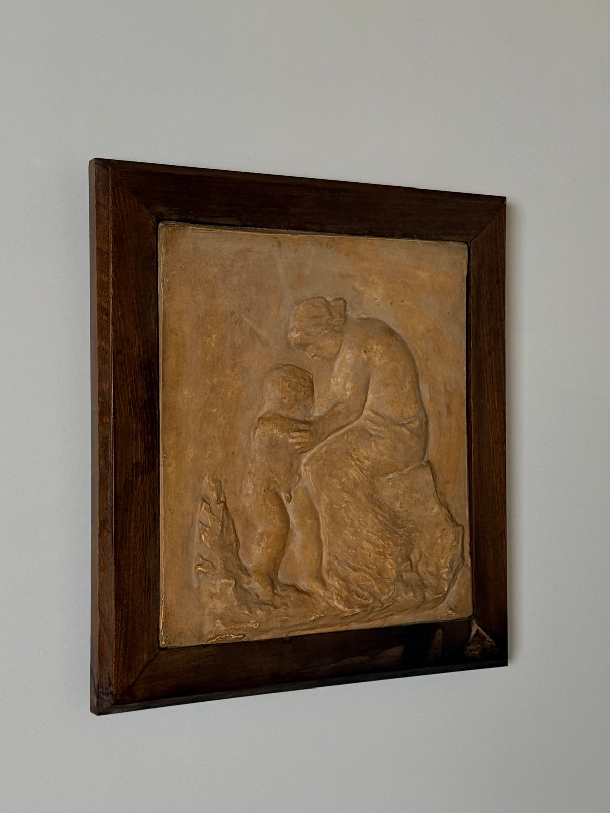 Sculpted plaster relief by Célestin Manalt, France, dated 1920 — lifestyle setting