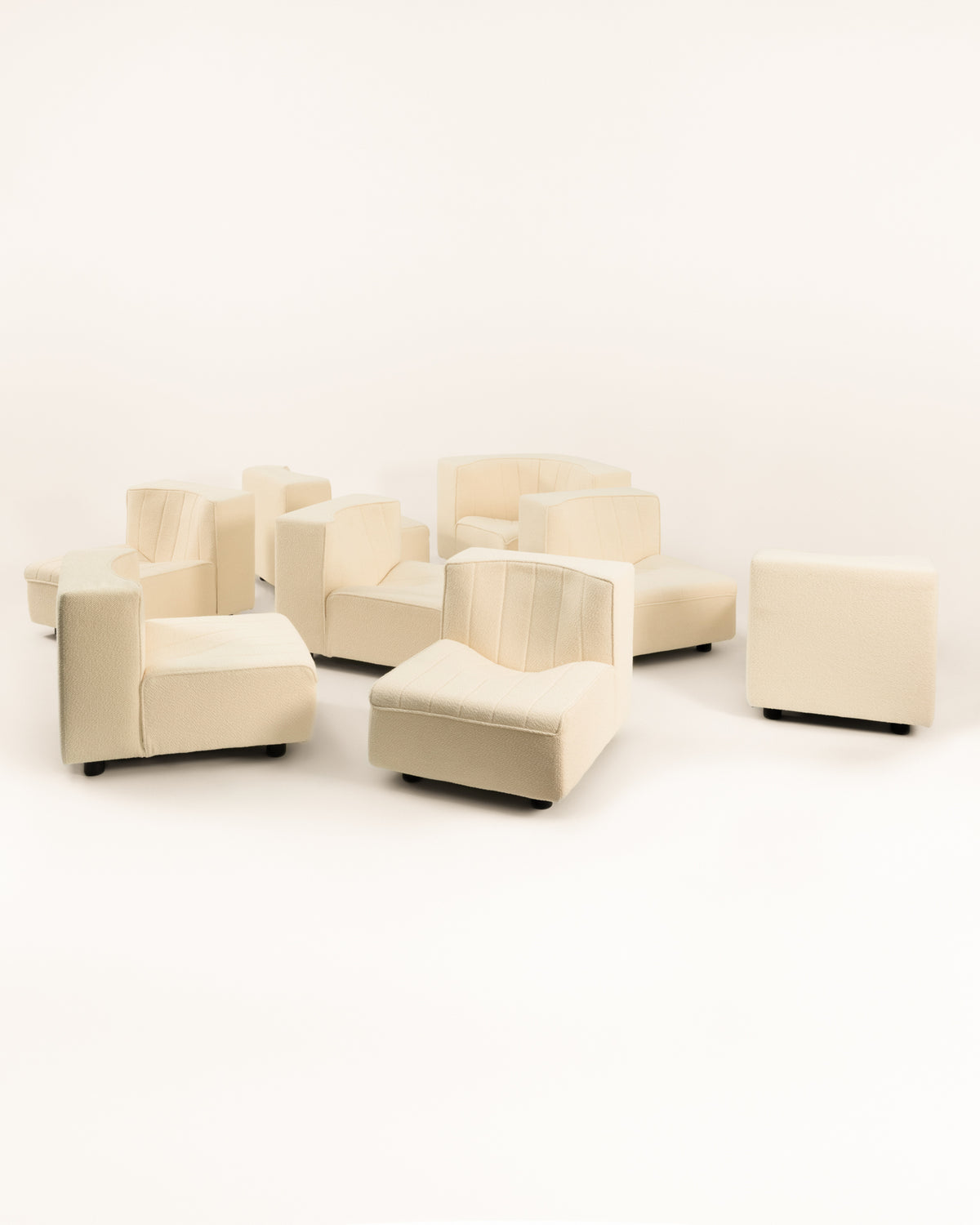 Individual cream modular sofa elements by Tito Agnoli arranged