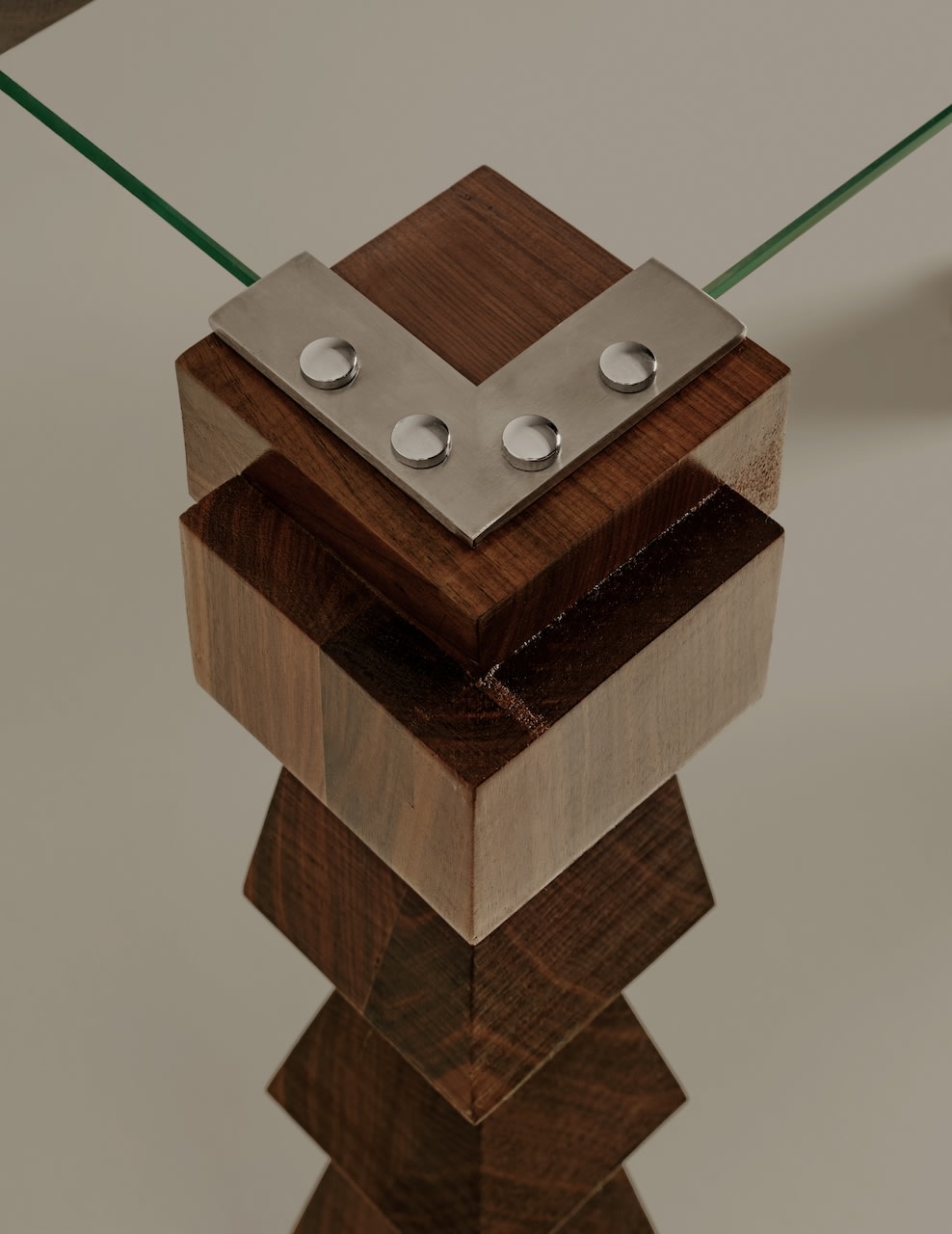 Attimo Console Table — close-up of wooden base with metal accents