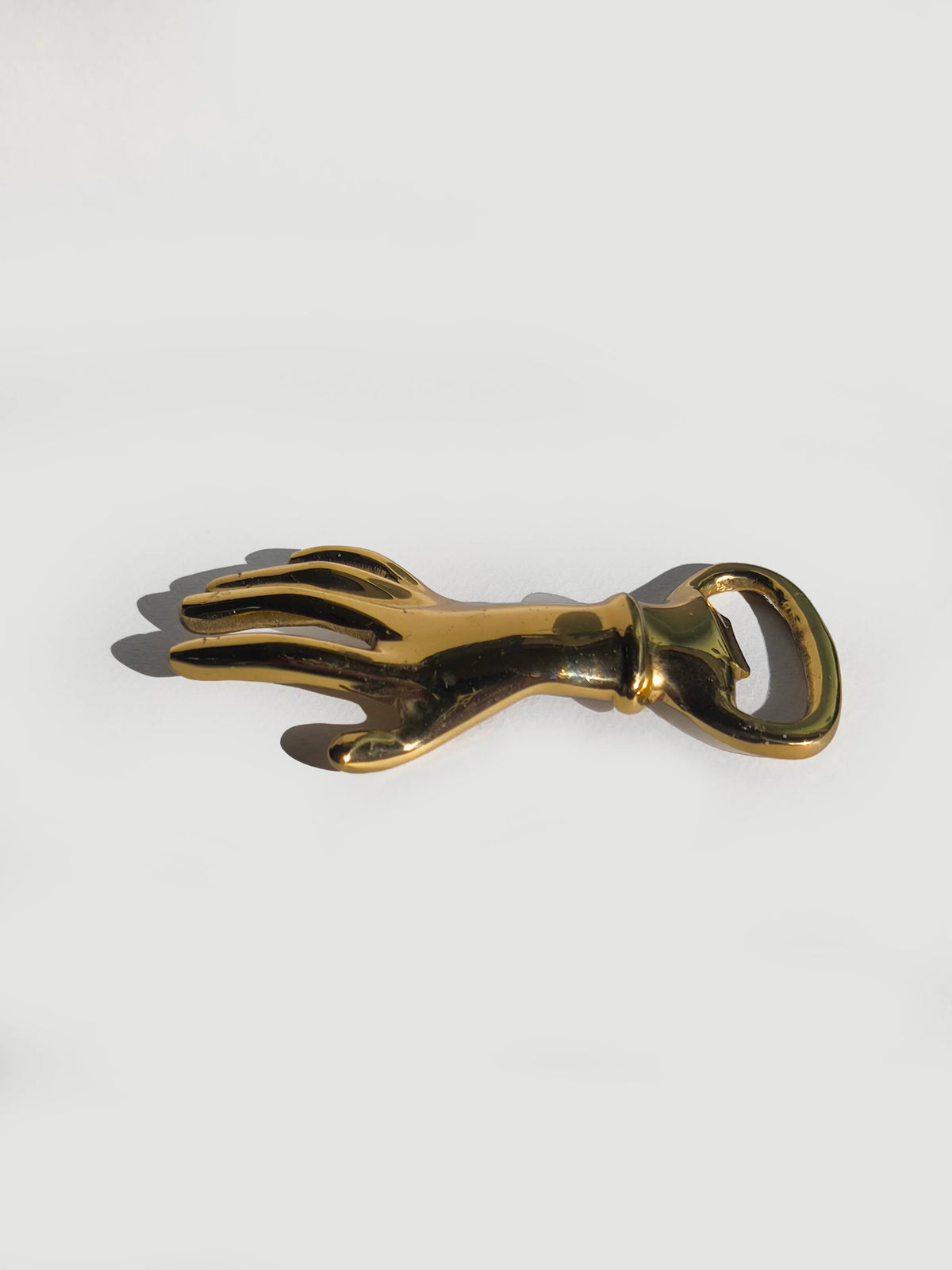 Brass Hand Bottle Opener — side angle