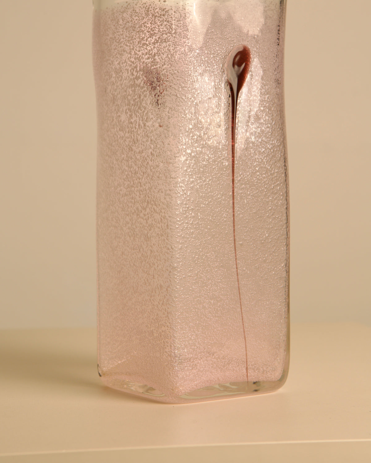 80s Italian Murano glass vase and purple feather — lifestyle setting