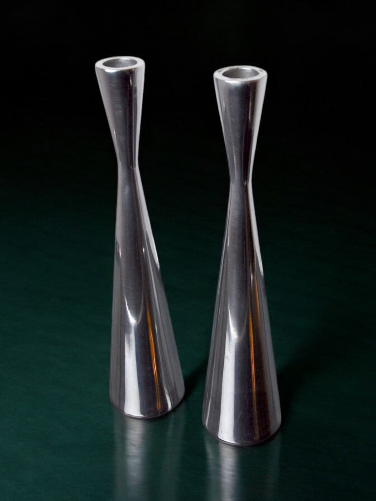 Pair of Scandinavian diabolo candlesticks, aluminium, suede, 1970 by Malamar Studio | The Oblist