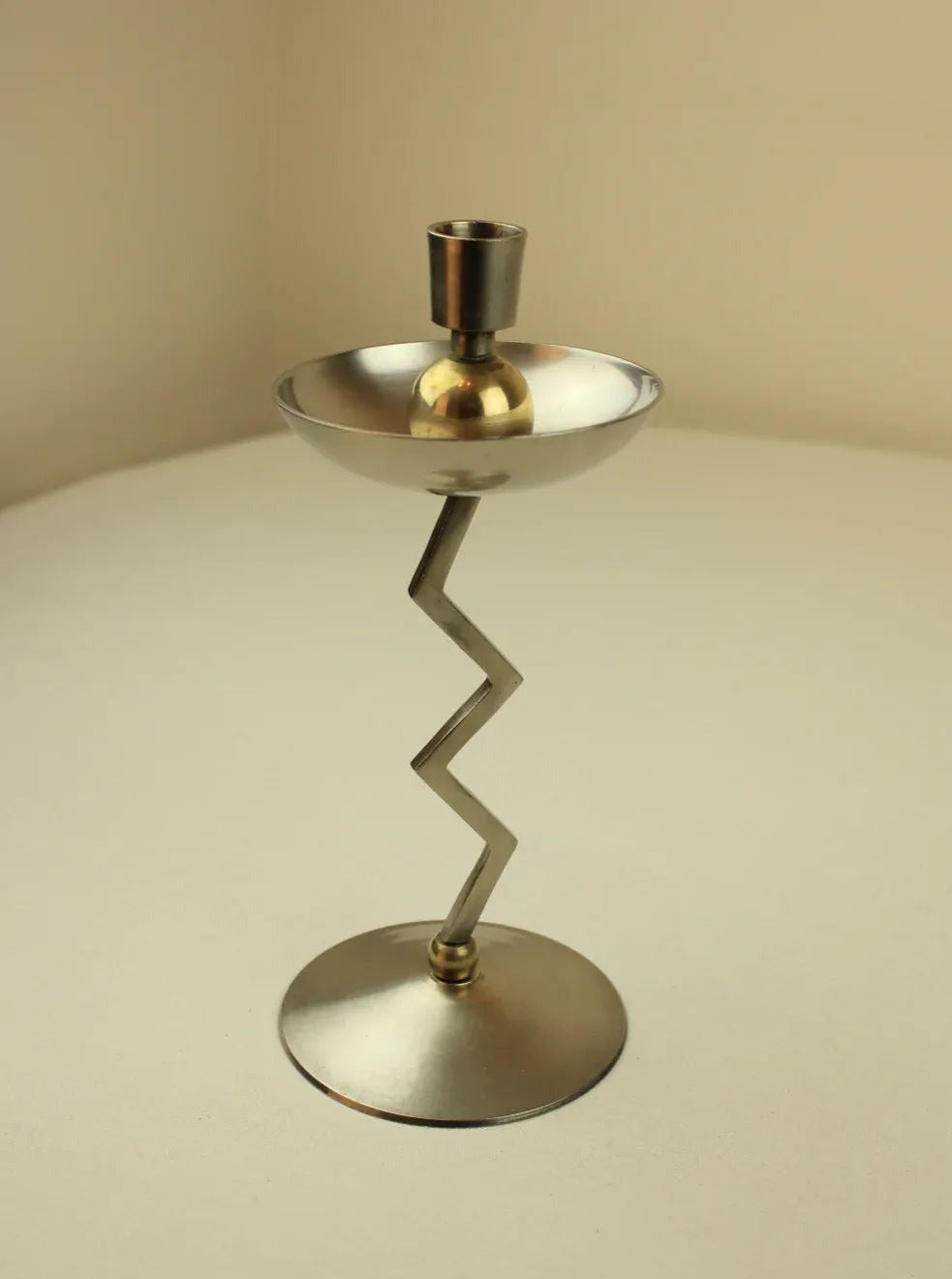 Beautiful brass Memphis Candleholder with geometric design and modern style