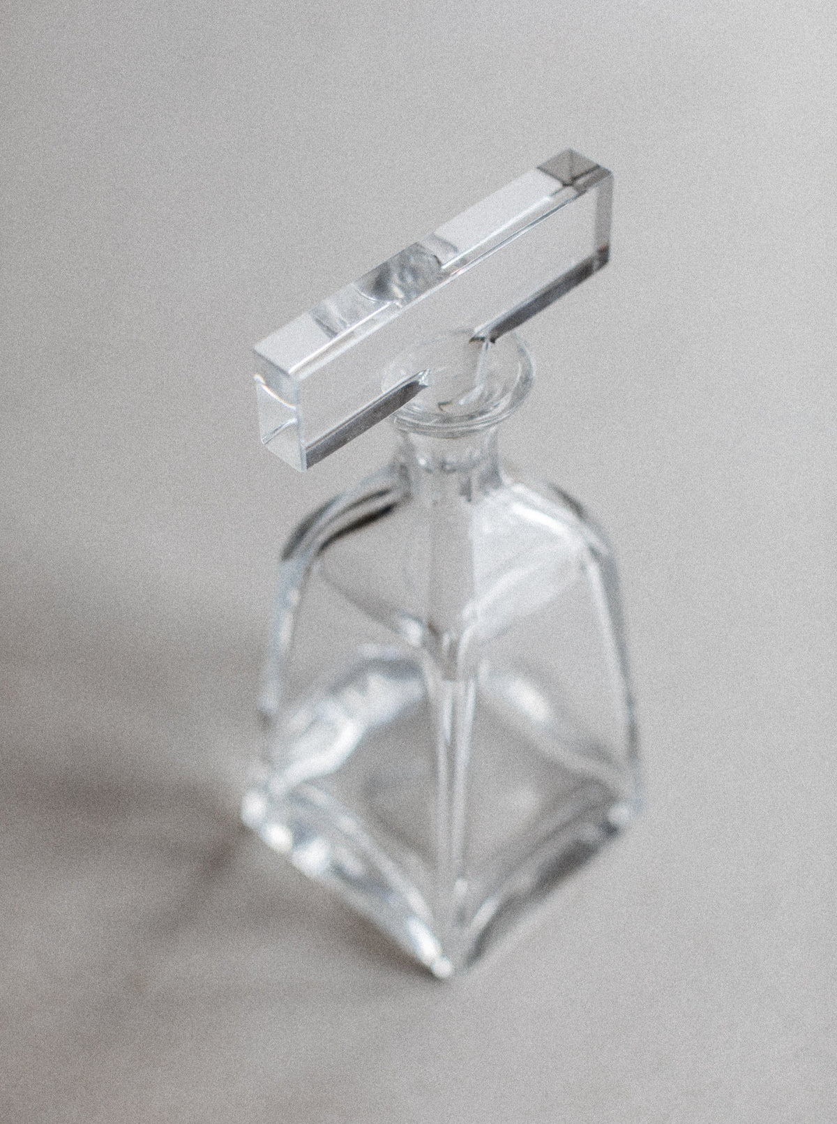 Handcrafted glass decanter featuring a unique and eye-catching pattern