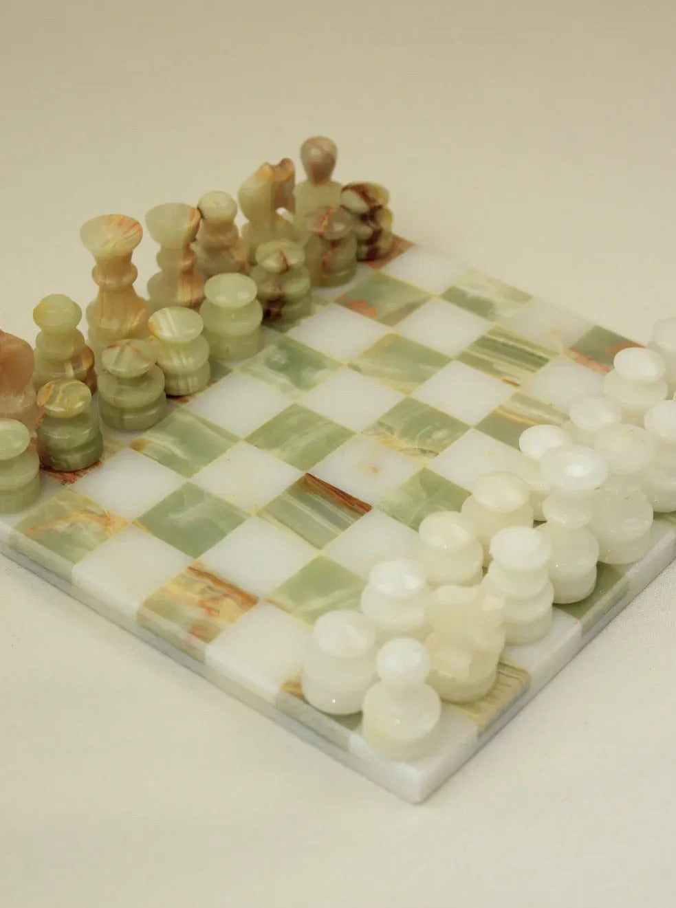 Handcrafted onyx chessboard with stunning veining and a timeless appeal