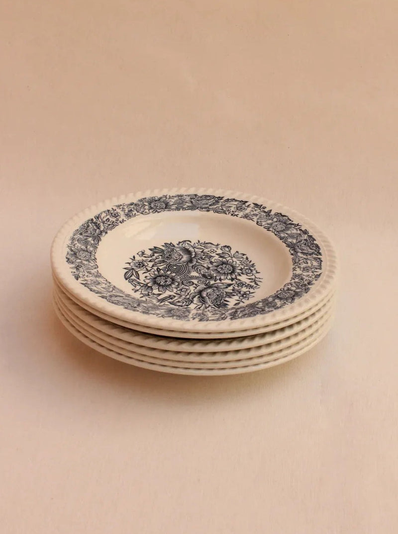 Set of 4 white porcelain plates with blue floral design and gold accents