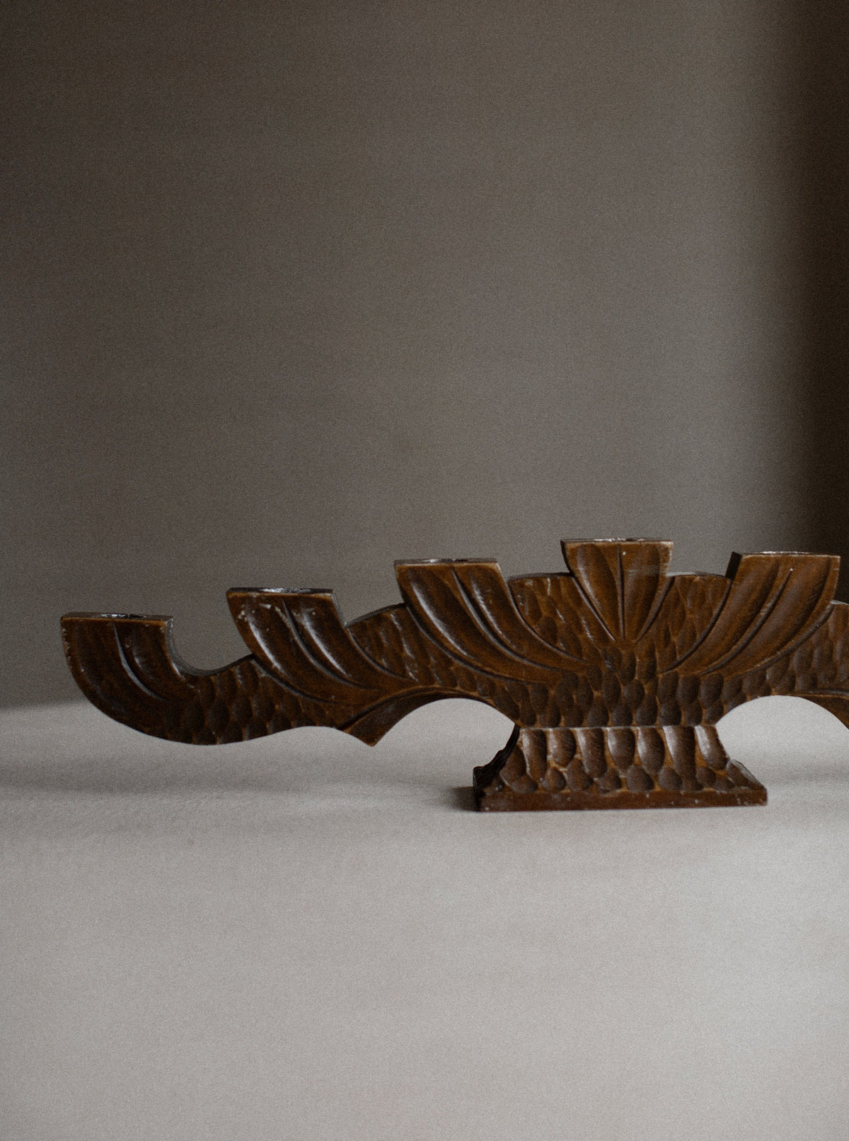 Handcrafted and elegant wooden candlestick holder with a polished finish
