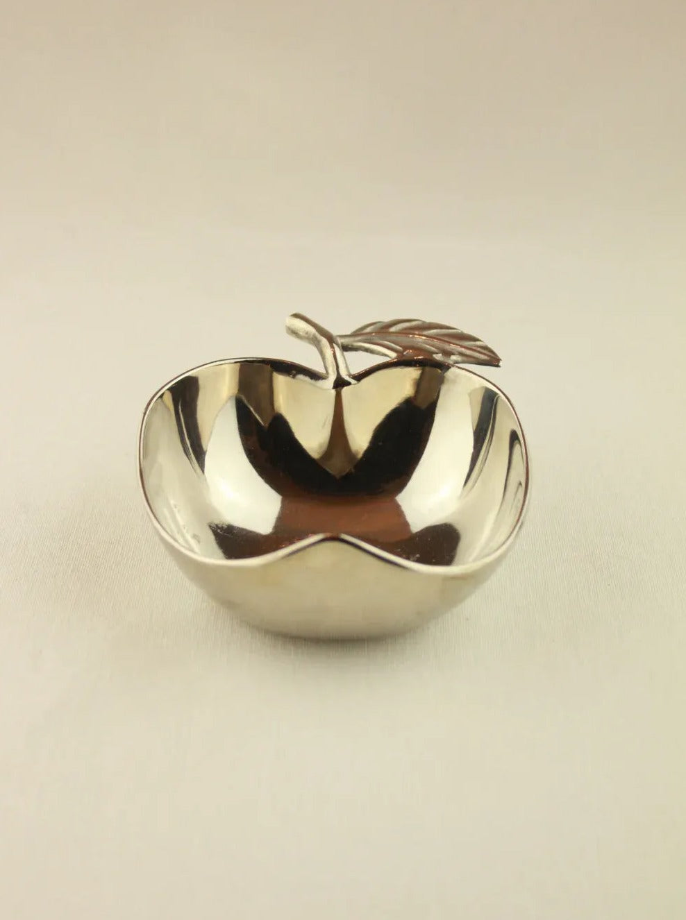 Handcrafted ceramic apple bowl in red color, perfect for serving fruit or snacks