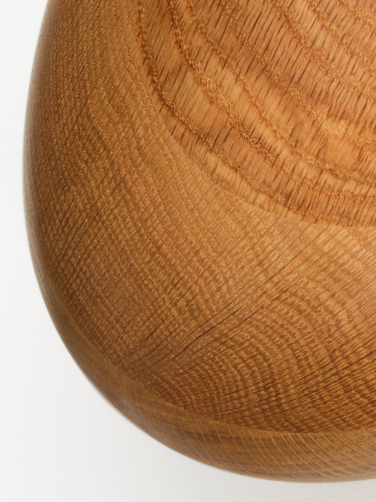 Minimalist Natural Oak Egg Sculpture in a modern home decor setting