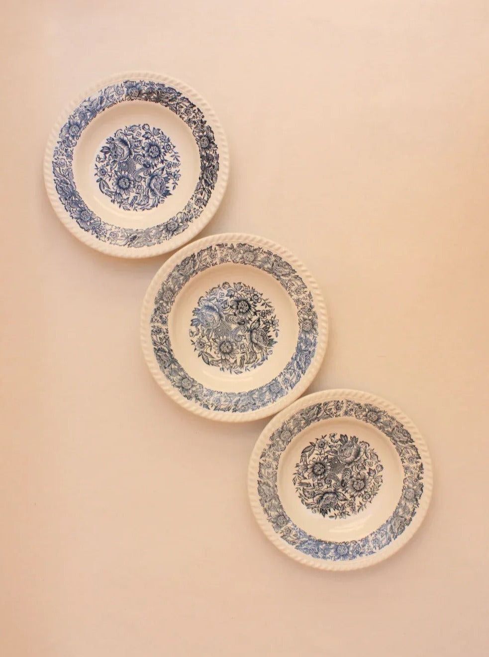 Square porcelain plates with delicate blue and white pattern