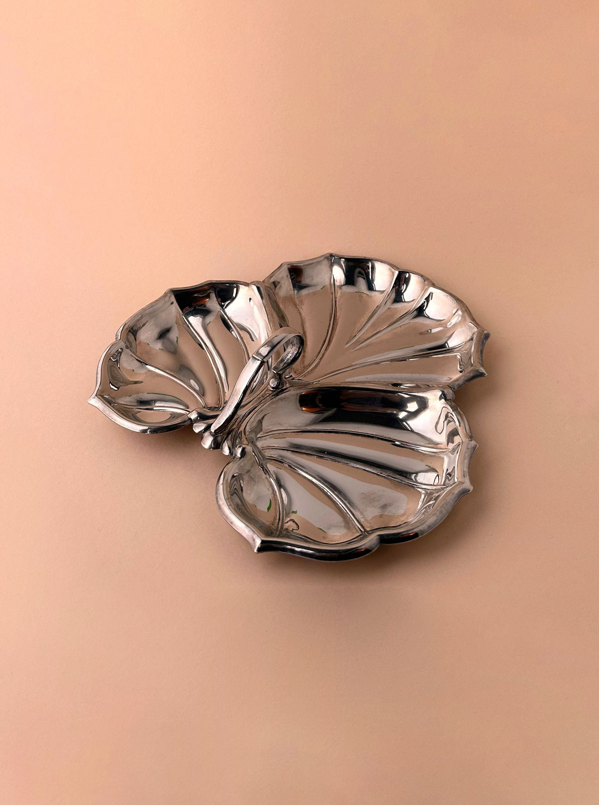 Elegant silver plated tender with sleek lines and art deco design influence