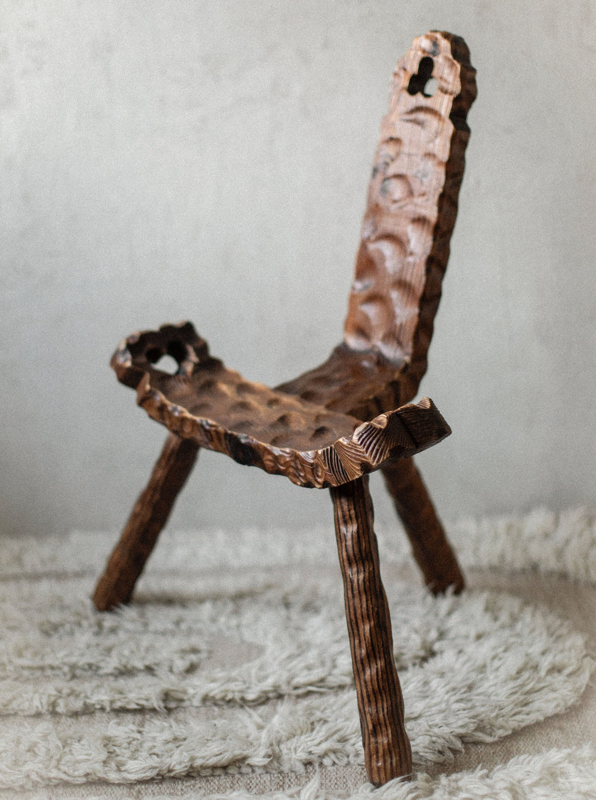Industrial Brutalist Chair featuring raw concrete and metal construction