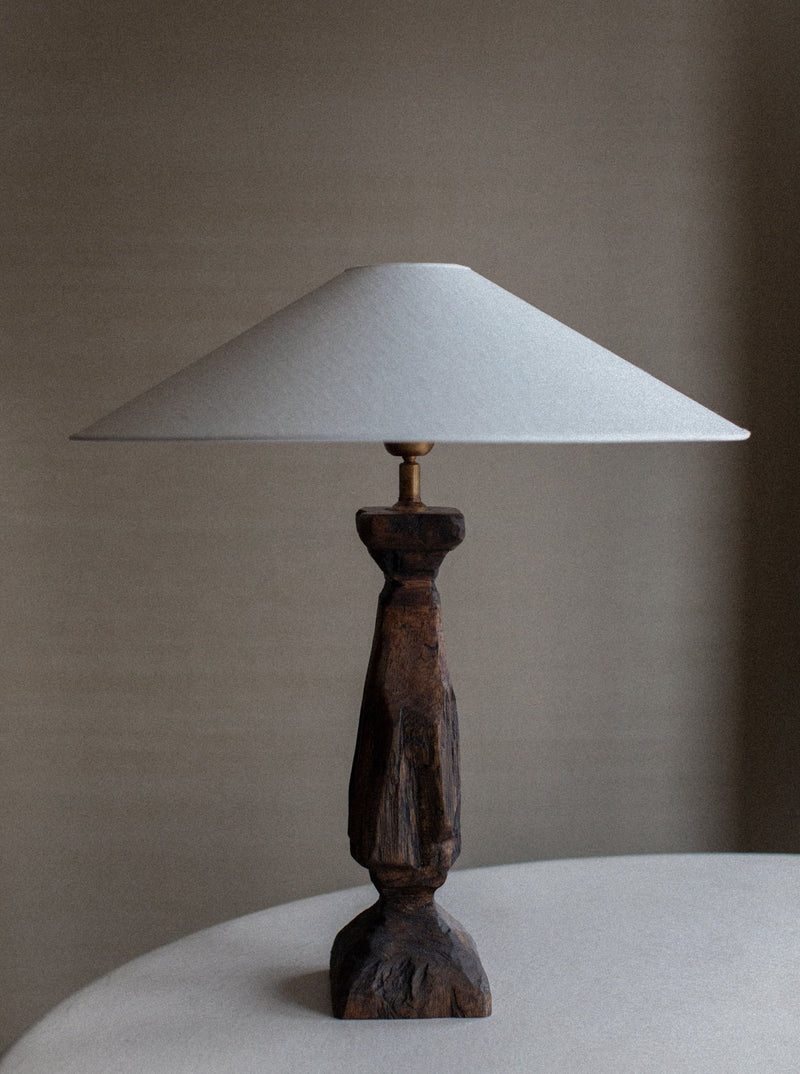 Handcarved Lamp 02 featuring intricate floral patterns and warm natural wood tones