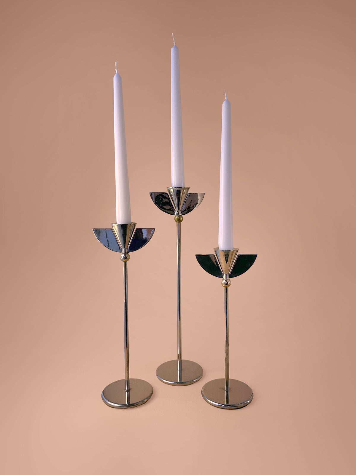 Italian Silver Art Deco Candleholders with intricate geometric designs and polished finish