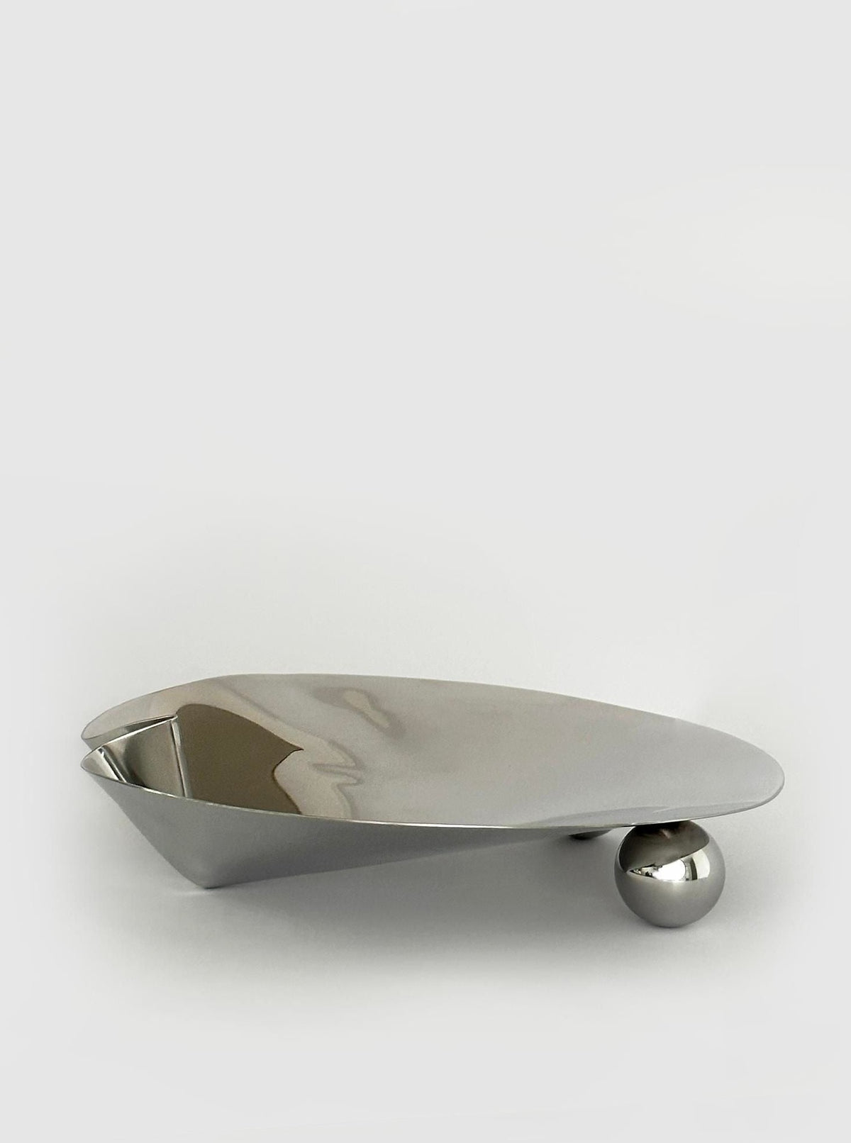 Stainless steel footed serving bowl with contemporary design and elegant style