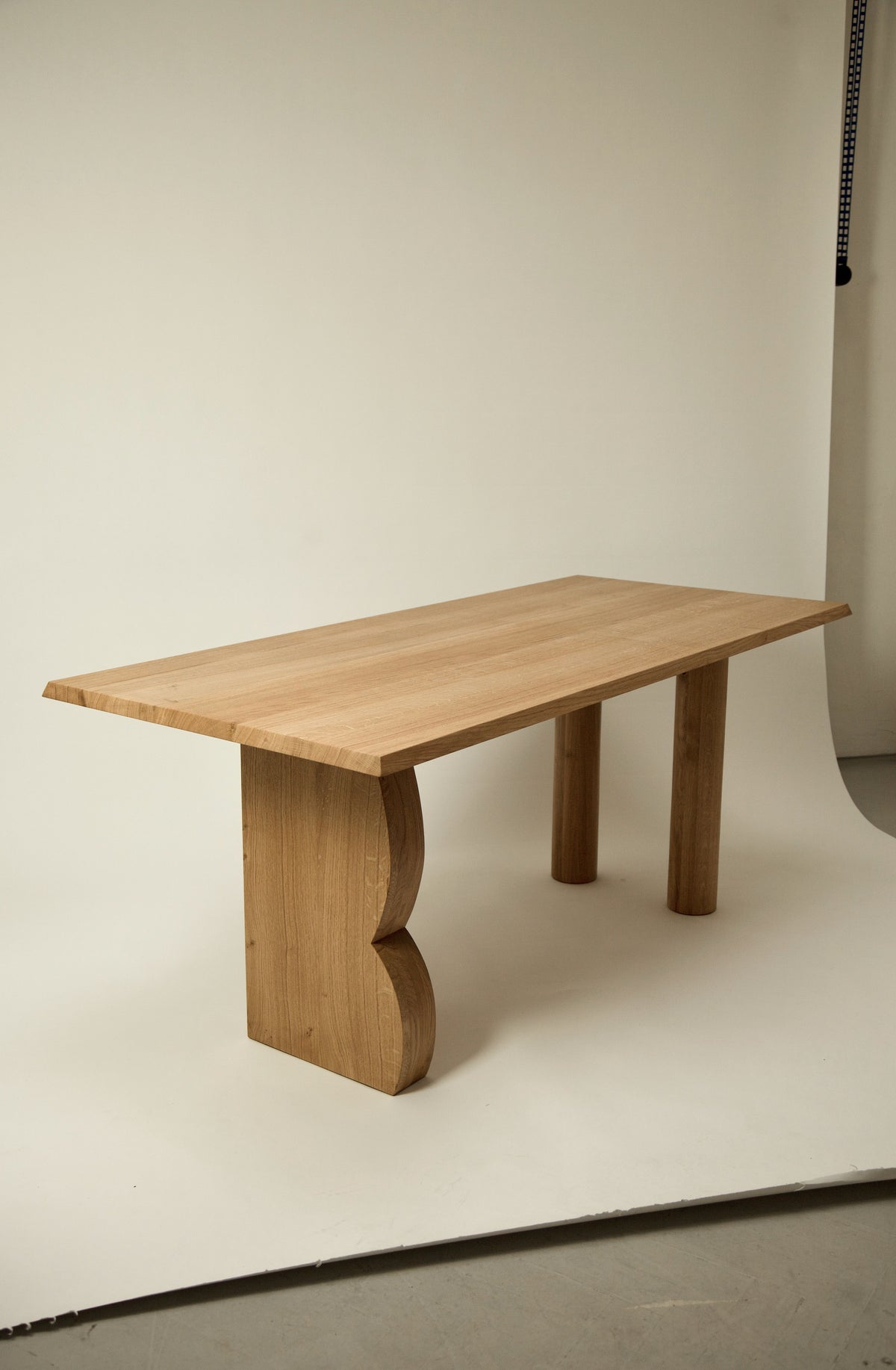 Solid wood Martello Dining Table with intricate carved details and ornate legs