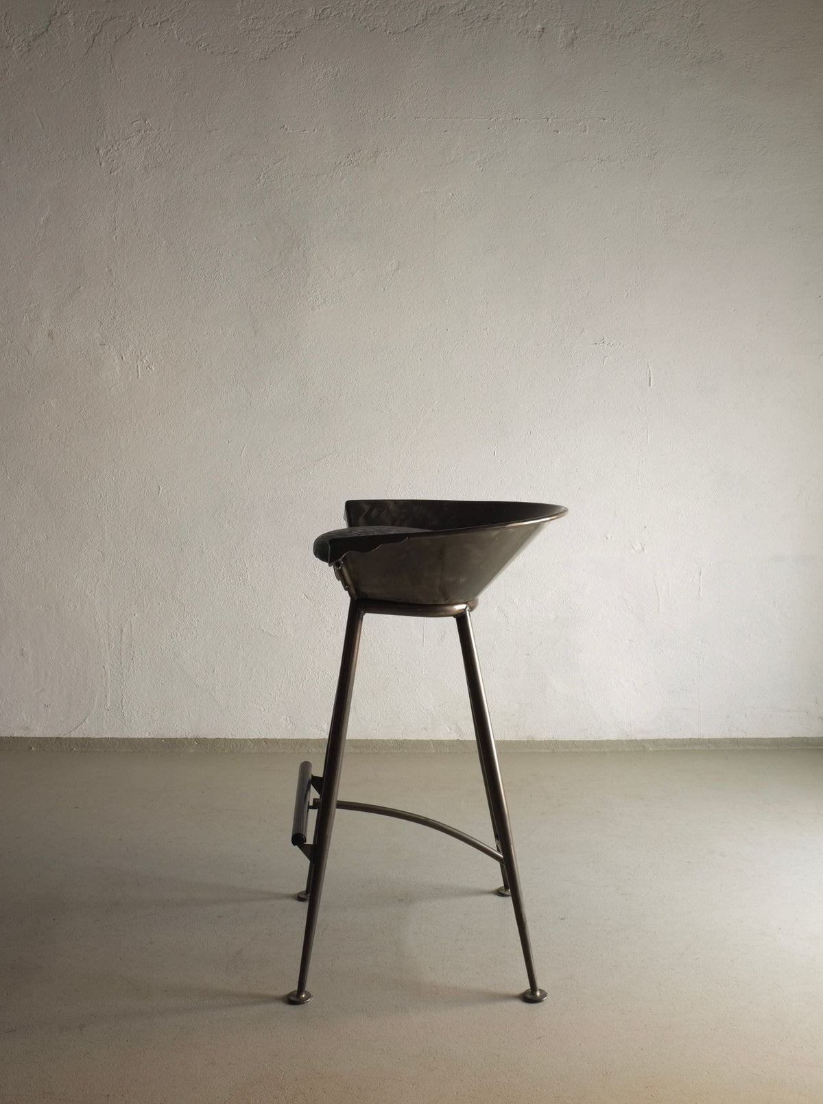 Pair of vintage 1980s Brutalist cast metal bar stools with industrial design