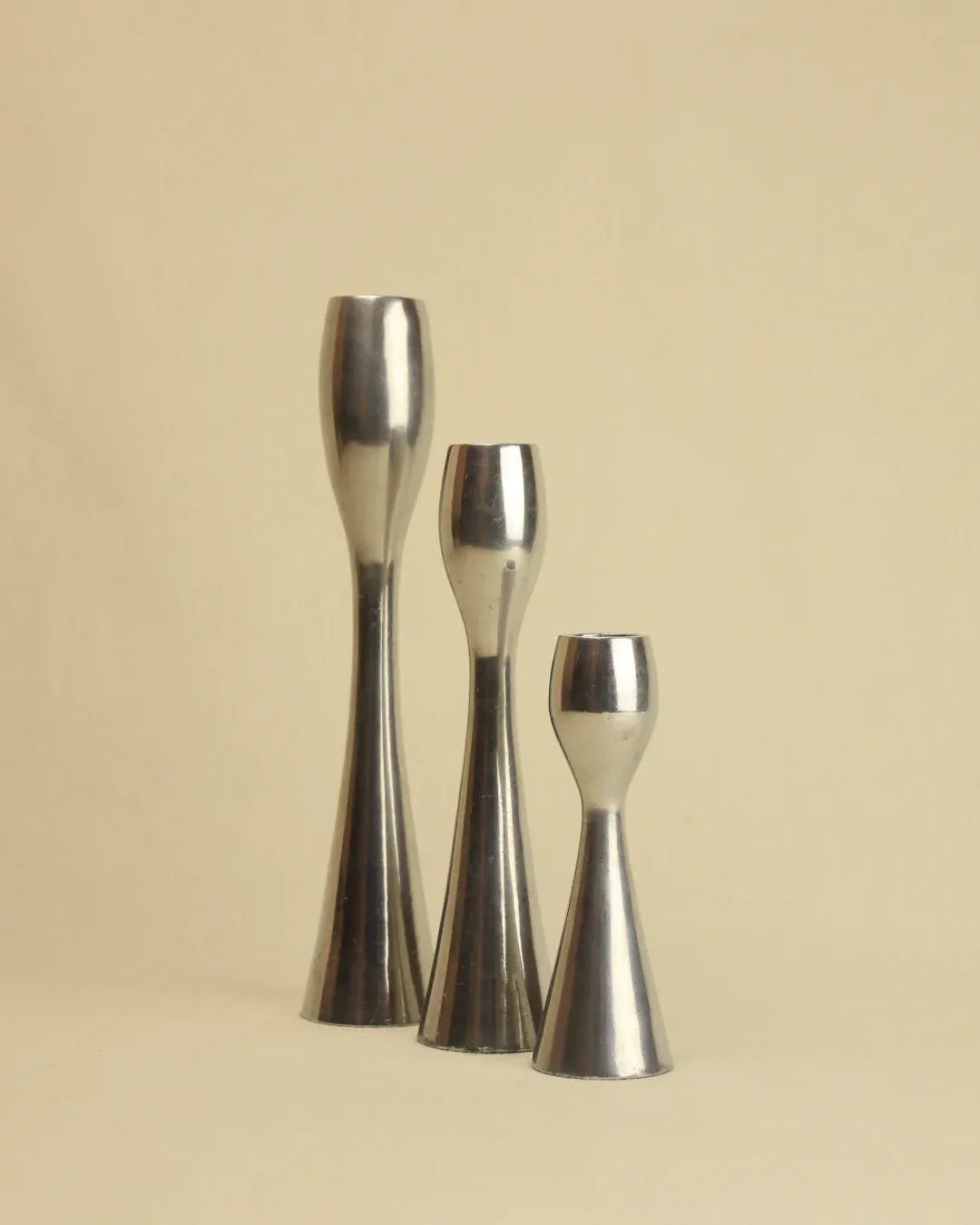Elegant candleholders with clean lines and geometric shapes